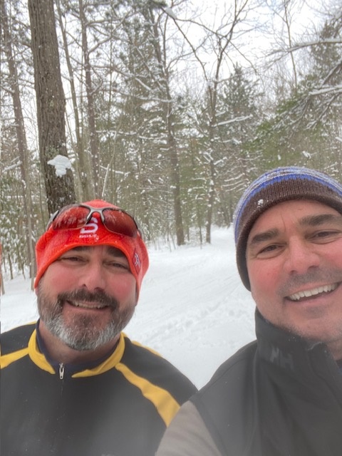 Brothers Matt and Brad Anderson outside in the winter.